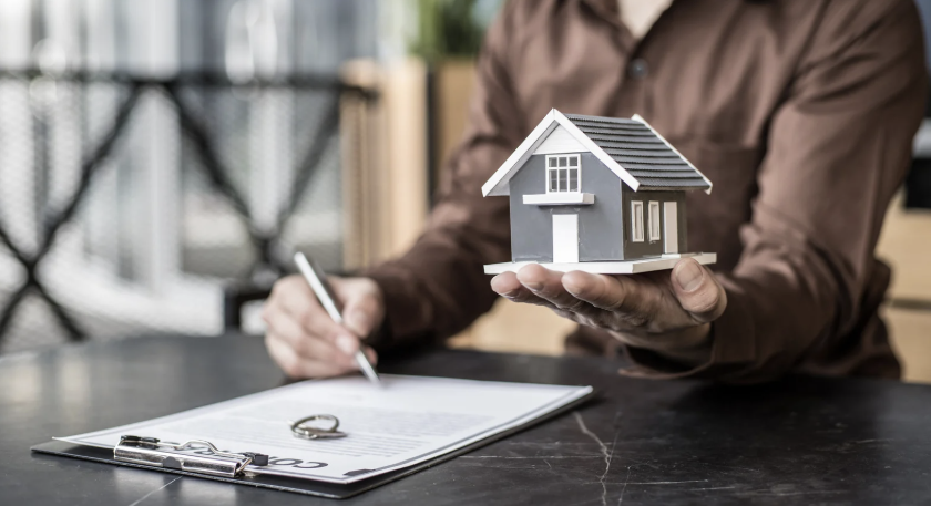 casa en mano Foto con casa en mano